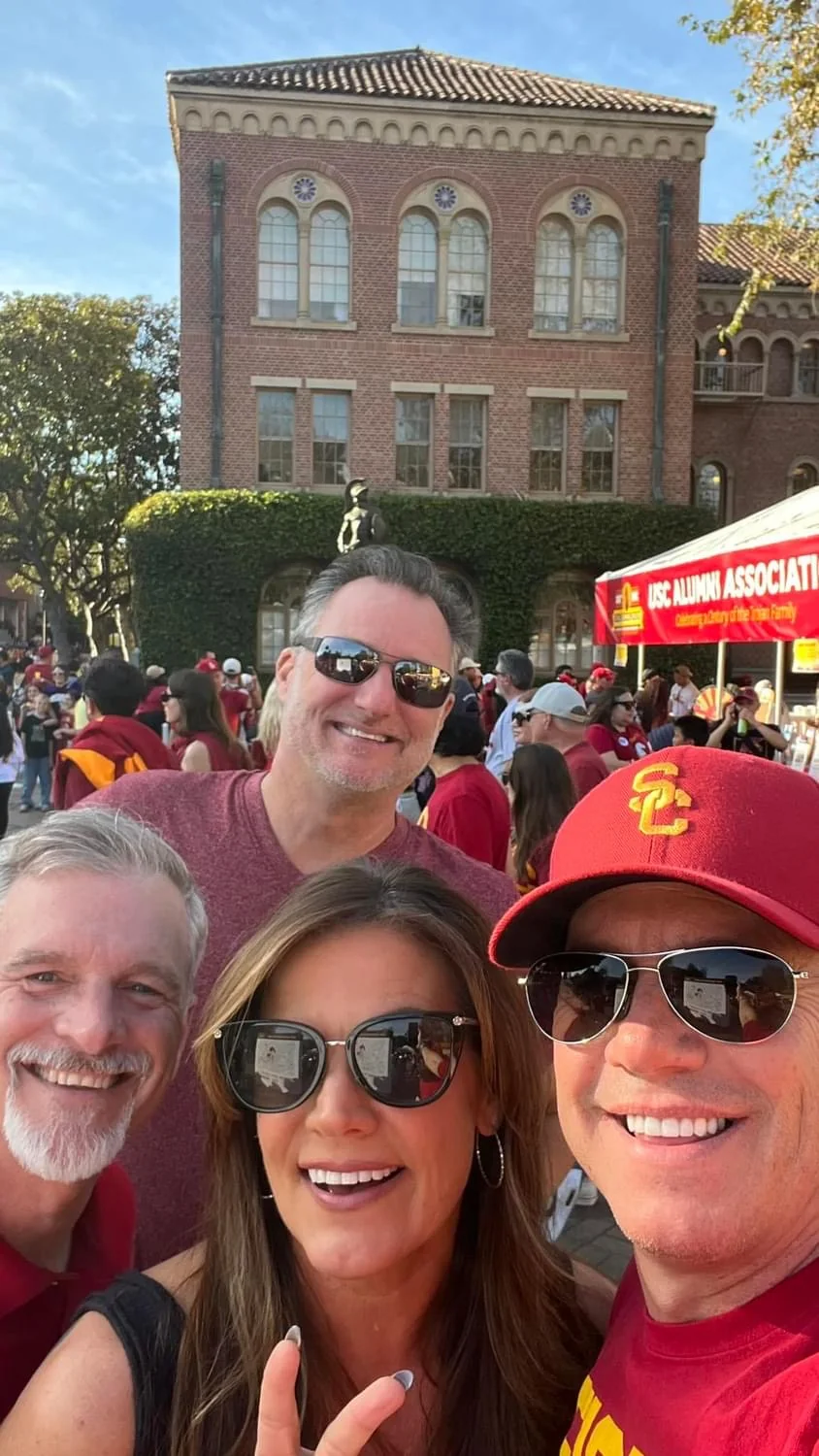 Mike Millett with Doug Flaig, Stacy Flaig and Donnie Flaig at USC